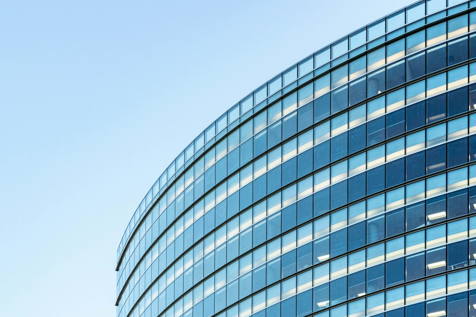 white and blue glass walled building